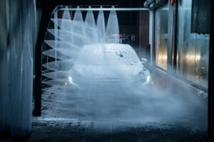 Car in car wash that needs Baytown windshield repair